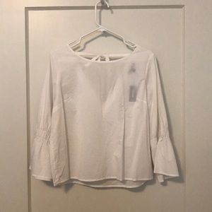 Never worn Express bell sleeve blouse. Size M.